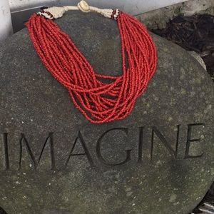 Hand made coral color beaded bracelet